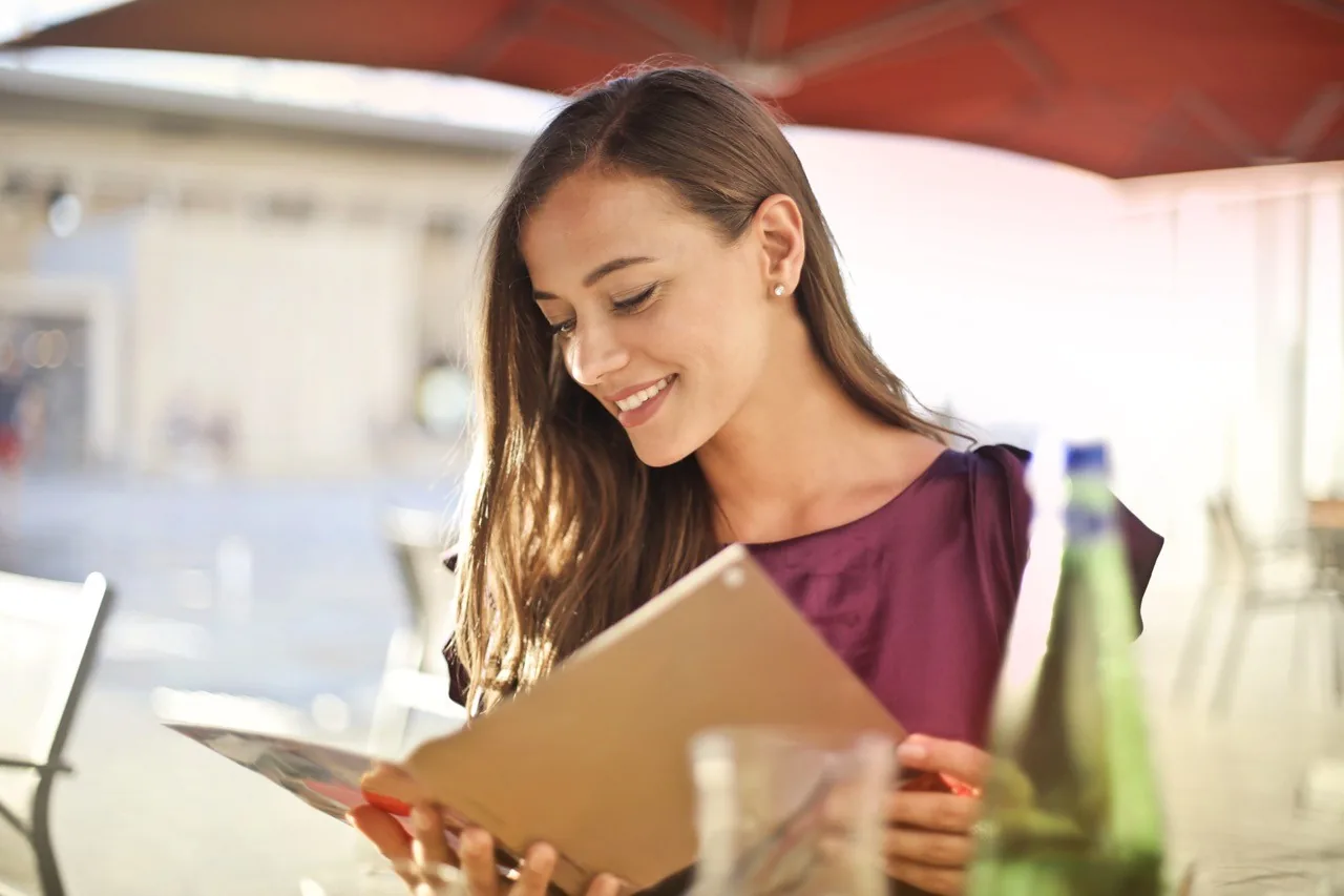 woman smile reading